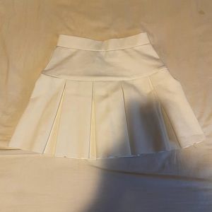 white pleated skirt